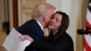 U.S. President Donald Trump greets Laken Riley's mother, Allyson Phillips, during an event to sign the Laken Riley Act at the White House in Washington on Jan. 29, 2025.