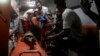 Palestinian medics evacuate wounded children during an Israeli bombardment of the Gaza Strip by ambulance to a hospital in Rafah early May 4, 2024.