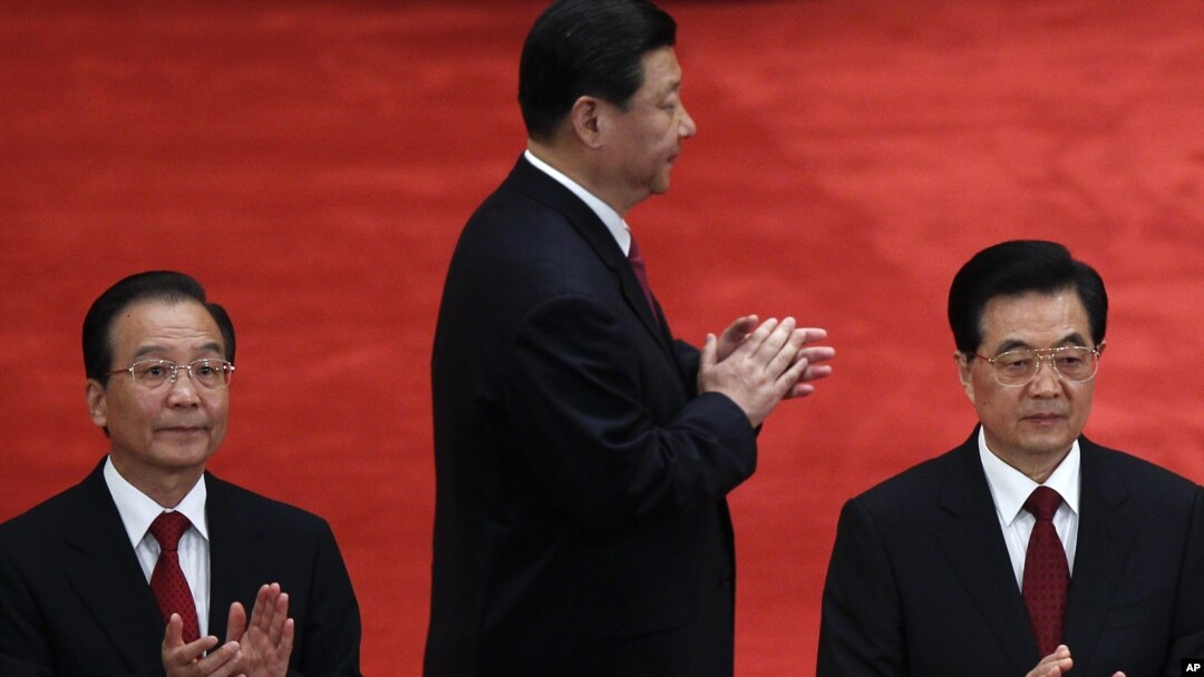 Chinese President Hu Jintao, right, Premier Wen Jiabao, left, and Vice President Xi Jinping, in Beijing, (May 4, 2012 file photo)
