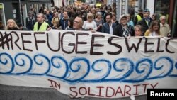 Ciudadanos daneses cuando realizaban una marcha en solidaridad con los refugiados que llegaban a su país en septiembre de 2012.