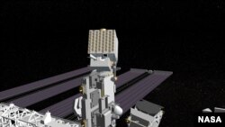 An artist's conception of the NICER telescope installed on the International Space Station.