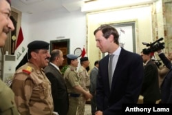 FILE - Jared Kushner, U.S. President Donald Trump's son-in-law and senior adviser, arrives at the Ministry of Defense, in Baghdad, Iraq, April 3, 2017.