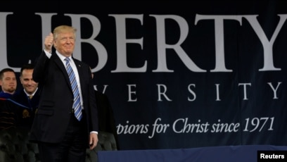 File U S President Donald Trump Gestures Before Delivering The Keynote Address At Liberty Universitys Commencement File U S President Donald Trump Gestures Before Delivering The Keynote Address At Liberty Universitys Commencement