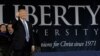 FILE - U.S. President Donald Trump gestures before delivering the keynote address at Liberty University's commencement in Lynchburg, Va., May 13, 2017. The university is producing a movie about a prophecy concerning Trump's election.