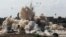  In this Oct. 29, 2014, file, photo, smoke rises after Egyptian army demolished houses on the Egyptian side on border town of Rafah.