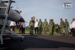 President Tsai Ing-wen attends a Taiwanese Air Force fighter jets take-off and landing drill, as part of the annual Han Kuang drill, in Pingtung, Taiwan, 15 September 2021. (TAIWAN MILITARY NEWS AGENCY/Handout via REUTERS)