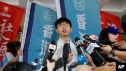 Pro-democracy activist Joshua Wong speaks to media at a court in Hong Kong, May 16, 2019.