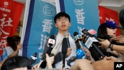 Pro-democracy activist Joshua Wong speaks to media at a court in Hong Kong, May 16, 2019. 