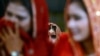 FILE - Pakistani brides attend a mass marriage ceremony in Karachi.