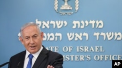 Israel's Prime Minister Benjamin Netanyahu announces full diplomatic ties will be established with the United Arab Emirates, during a news conference on Thursday, Aug. 13, 2020 in Jerusalem. In a nationally broadcast statement, Netanyahu said the …