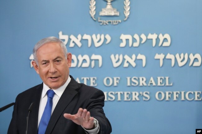 Israel's Prime Minister Benjamin Netanyahu announces full diplomatic ties will be established with the United Arab Emirates, during a news conference on Thursday, Aug. 13, 2020 in Jerusalem.