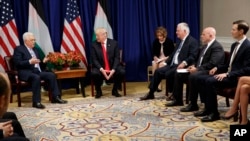 President Donald Trump meets with Palestinian President Mahmoud Abbas at the Palace Hotel during the United Nations General Assembly, in New York, Sept. 20, 2017. From left, Abbas, Trump, an unidentified interpreter, Secretary of State Rex Tillerson, National Security Adviser H.R. McMaster, and White House senior adviser Jared Kushner.