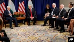 President Donald Trump meets with Palestinian President Mahmoud Abbas at the Palace Hotel during the United Nations General Assembly, in New York, Sept. 20, 2017.