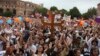 People cheer at the Republic Square in Yerevan, May 8, 2018. 