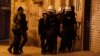 Riot police enter a house during a raid to arrest suspected protesters involved in clashes in the village of Sanabis, west of Manama (file photo).