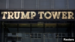 FILE- The Trump Tower logo in New York, May 23, 2016. 