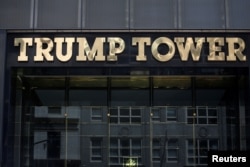 FILE- The Trump Tower logo in New York, May 23, 2016.