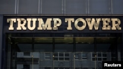 FILE- The Trump Tower logo in New York, May 23, 2016. 