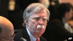 FILE - U.S. National Security Adviser John Bolton, attends a conference of more than 50 nations that largely support Venezuelan opposition leader Juan Guaido in Lima, Peru, Aug. 6, 2019.