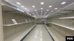 Estanterías vacías en un supermercado de Miami, el viernes 13 de marzo de 2020.