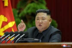 North Korean leader Kim Jong Un speaks during the 5th Plenary Meeting of the 7th Central Committee of the Workers' Party of Korea (WPK) in this undated photo released on Dec. 28, 2019 by North Korean Central News Agency (KCNA).