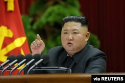 North Korean leader Kim Jong Un speaks during the 5th Plenary Meeting of the 7th Central Committee of the Workers' Party of Korea (WPK) in this undated photo released on Dec. 28, 2019 by North Korean Central News Agency (KCNA).