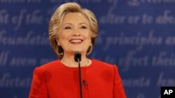 Democratic presidential nominee Hillary Clinton speaks during the presidential debate with Republican presidential nominee Donald Trump at Hofstra University in Hempstead, N.Y., Sept. 26, 2016. 