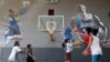 Boys plays at the &quot;House of Kobe&quot; basketball court in Valenzuela, north of Manila, Philippines. Fans left flowers and messages on the walls at the newly inaugurated court after learning of Bryant&#39;s death. Bryant died in a helicopter crash.