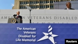 U.S. President Barack Obama makes remarks at the dedication of the American Veterans Disabled for Life Memorial, near the U.S. Capitol, in Washington, October 5, 2014. 