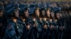 China Orders Struggling State Firms to Hire Laid-off Soldiers