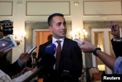 FILE - Italian Deputy PM Luigi Di Maio speaking during a news conference in Cairo, Aug. 29, 2018.