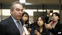 U.S. Assistant Secretary of State Kurt Campbell speaks to the media upon his arrival at Narita international airport, March 9, 2011.