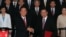 Chen Yunlin, left, shakes hands with Chiang Pin-kung, after signing investment protection pact, Taipei, Taiwan, August 9, 2012. 