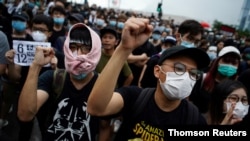 Protesters attend a demonstration demanding Hong Kong's leader steps down and withdraws the extradition bill, in Hong Kong, June 17, 2019. 