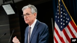 Federal Reserve Chair Jerome Powell speaks during a news conference, Tuesday, March 3, 2020, to discuss an announcement from the Federal Open Market Committee, in Washington.