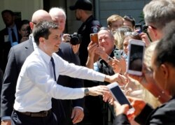 U.S. Democratic presidential candidate Mayor Pete Buttigieg shakes hands with supporters after delivering remarks on foreign policy and national security in Bloomington, Indiana, June 11, 2019.