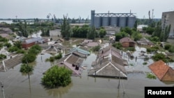 Затоплені регіони поблизу Нової Каховки, 7 червня 2023 року REUTERS/Vladyslav Smilianets TPX IMAGES OF THE DAY