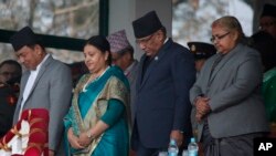 FILE - Chief Justice of the Supreme Court Sushila Karki (left) at a Democracy Day observance with Nepalese Prime Minister Pushpa Kamal Dahal, Nepalese President Bidhya Devi Bhandari and Vice President Nanda Kishor Pun, in Kathmandu, Nepal, Feb. 18, 2017 