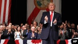 President Donald Trump arrives to speak about Cuba policy, June 16, 2017, in Miami. 