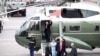 Former U.S. President Barack Obama waves as newly sworn-in President Donald Trump walks with wife Melania Trump, on Capitol Hill in Washington, D.C., Jan. 20, 2017.