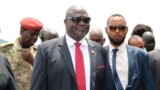 FILE - Riek Machar, center, now his country's first vice president, is pictured in Juba upon his return to South Sudan on Oct. 19, 2019.