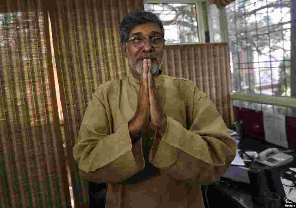 2014 Nobel Peace laureate Kailash Satyarthi speaks with the media in New Delhi, India, Oct. 10, 2014. 