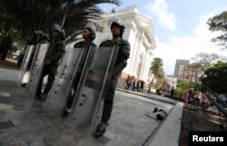 Members of security forces stand guard outside the National Assembly in Caracas, Venezuela, May 7, 2019.