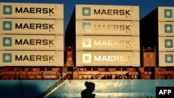 FILES - Containers of Danish shipping company Maersk are seen in Copenhagen on Sept. 14, 2023. Shipping giant Maersk said on Jan. 2, 2024, it would continue suspending the passage of vessels through a key Red Sea strait.