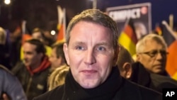 FILE - In this March 16, 2016 file photo Bjoern Hoecke, chairman of the Alternative fuer Deutschland (AfD) in the German state of Thuringia, leads a rally in Erfurt, Germany. AfD leadership has voted to start proceedings that could see the prominent member expelled over comments suggesting that the country end its tradition of acknowledging and atoning for the Nazi past, the party said Monday, Feb. 13, 2017.