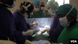 The surgeons at St. Elizabeth's cardiac care center perform difficult procedures at a facility in the middle of remote Cameroon. (Photo by Eugene Nforngwa)