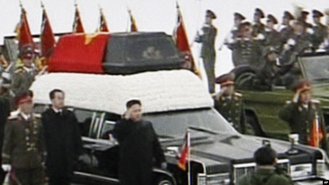 TV image made from KRT video shows Kim Jong Un, Kim Jong Il's youngest son and successor as he walks next to his father's hearse during a funeral procession for the late North Korean leader in Pyongyang, December 28, 2011.