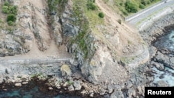 Landslides block State Highway One near Kaikoura on the upper east coast of New Zealand's South Island following an earthquake, Nov. 14, 2016.