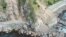 Landslides block State Highway One near Kaikoura on the upper east coast of New Zealand's South Island following an earthquake, Nov. 14, 2016.