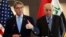U.S. Energy Secretary Rick Perry, left, is seen with Iraqi oil minister, Thamir Ghadhban, during a U.S. Chamber of Commerce U.S.-Iraq business initiative mission to Iraq, in Baghdad, Dec. 11, 2018.